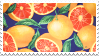 a pile of citrus fruit